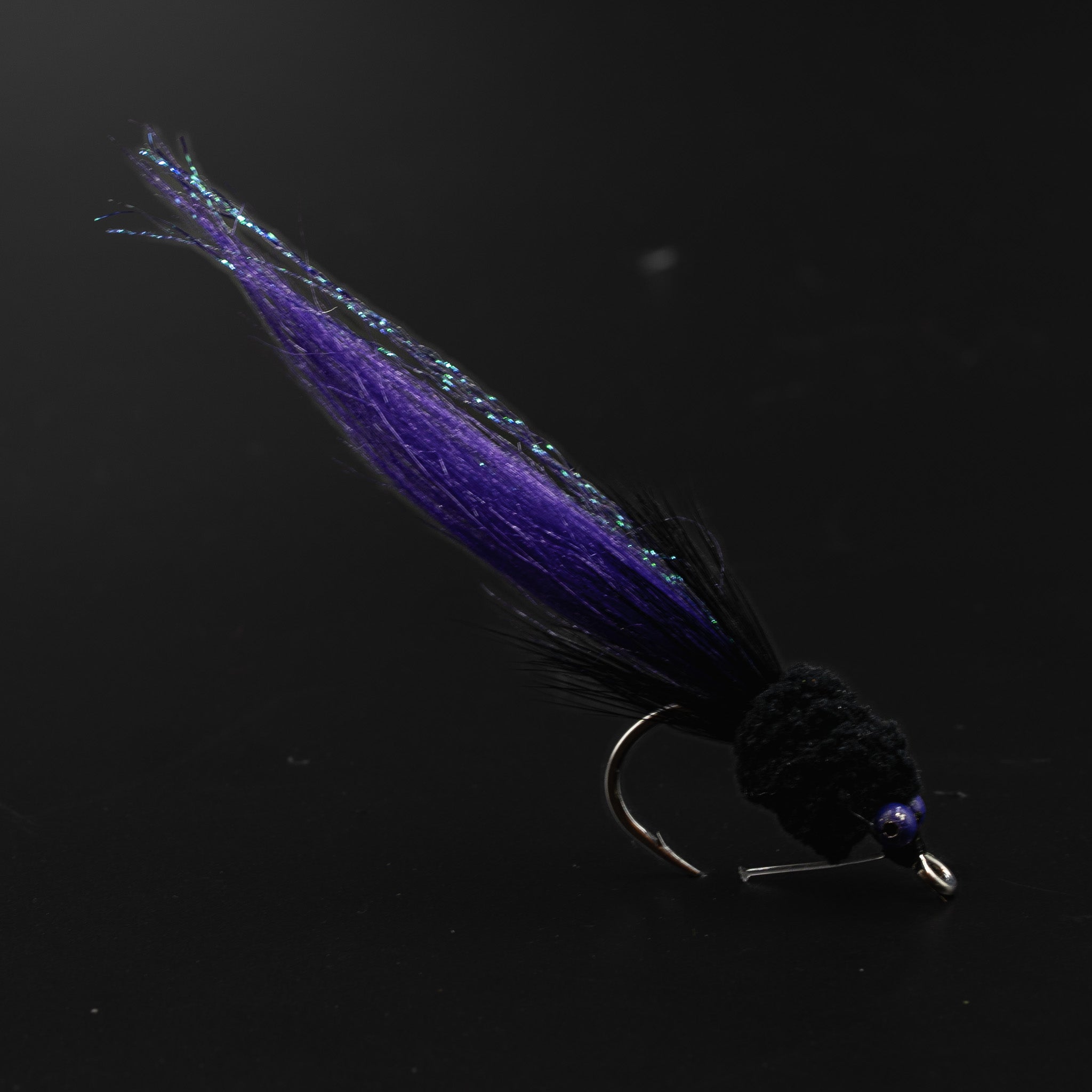 Big Moppa bull redfish fly by FINATICS — Mop Chenille head, craft fur body, bead chain eyes, tied on Ahrex SA220 1/0