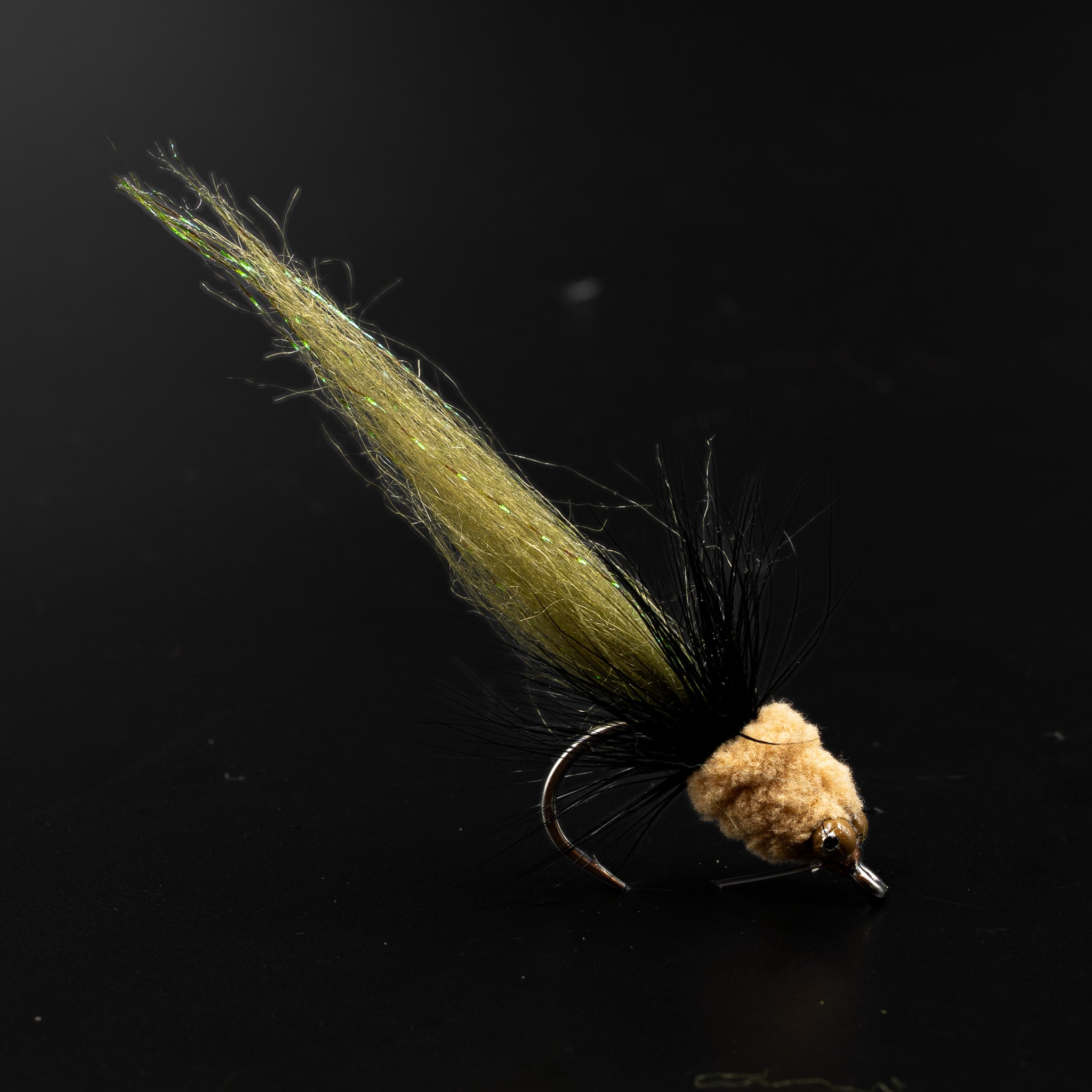Big Moppa bull redfish fly by FINATICS — Mop Chenille head, craft fur body, bead chain eyes, tied on Ahrex SA220 1/0