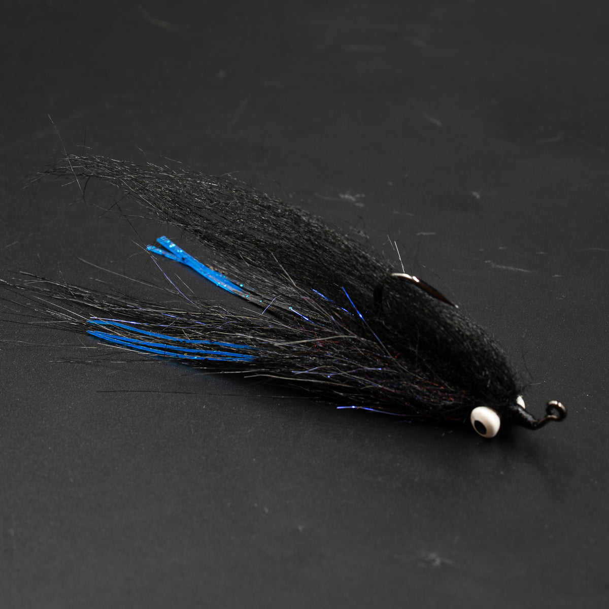 Po' Boy by FlySmith Flies in Black, 2/0 jig hook with lead eyes